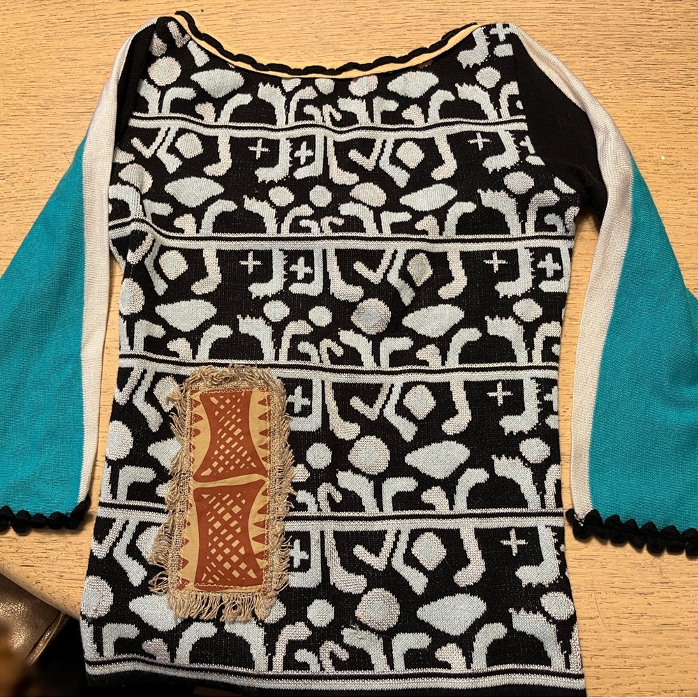 Gorgeous SAVE THE QUEEN top. Size marked Large but fits like medium. NWT.
